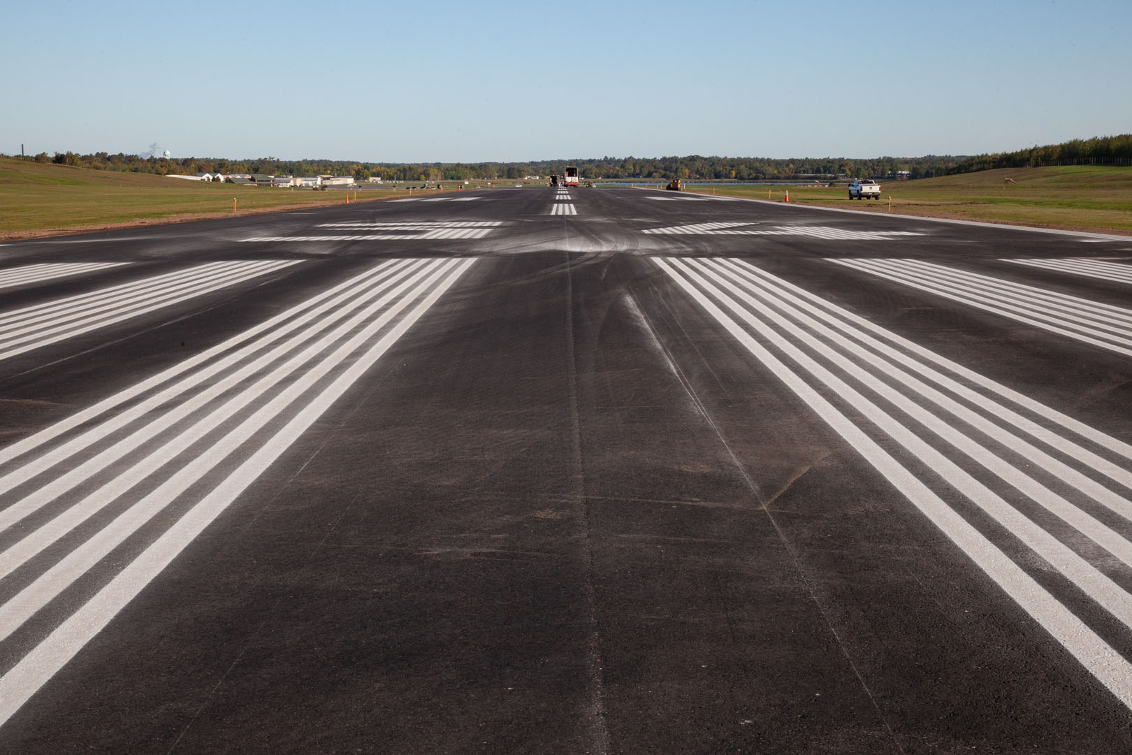 Paved runway with striping at an airport