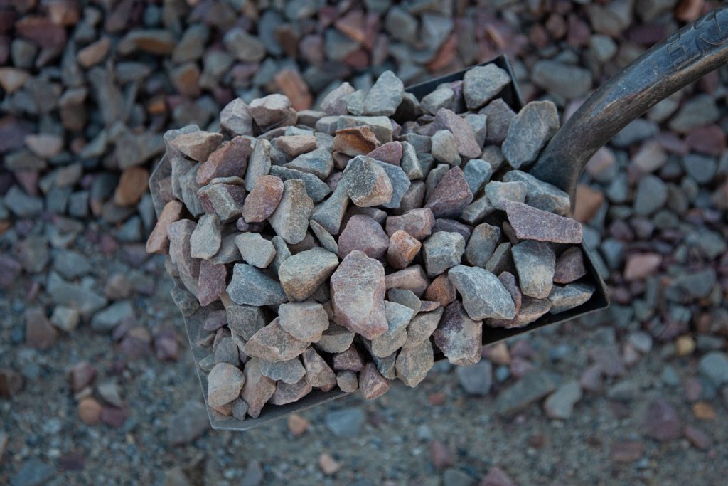 Shovel full of 1.5 inch quarry rock