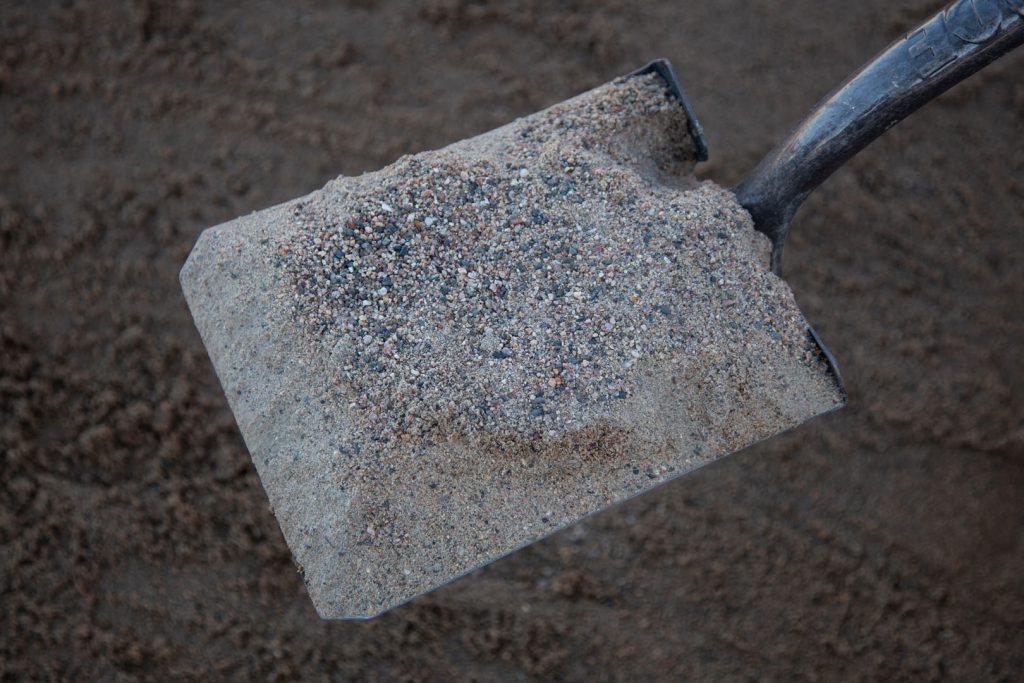 Shovel full of washed sand